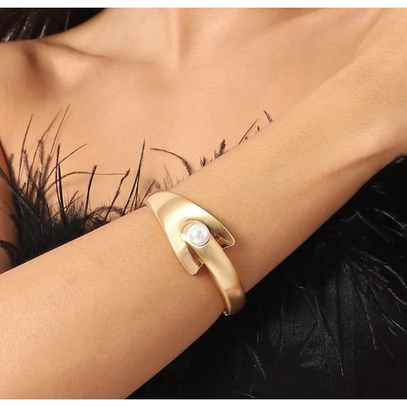 Bracelete pontas pérola dourado