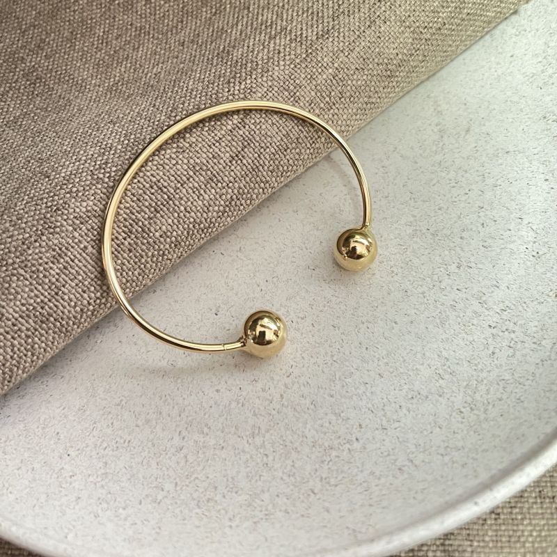 Bracelete bola duo banho ouro