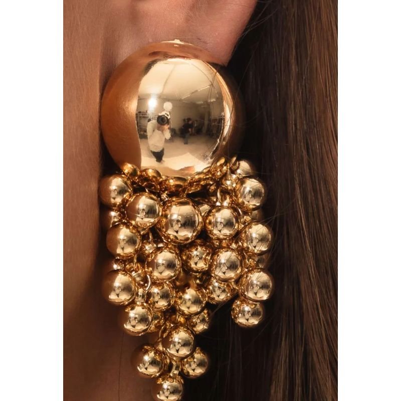 Brinco cascata bolas dourado