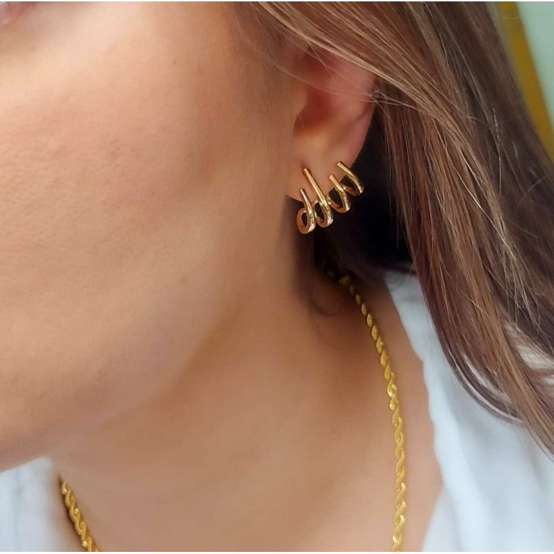 BRINCO EARCUFF QUATRO RISCOS LISO BANHO OURI