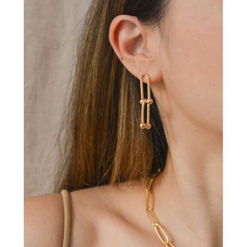 Brinco ilha dourado