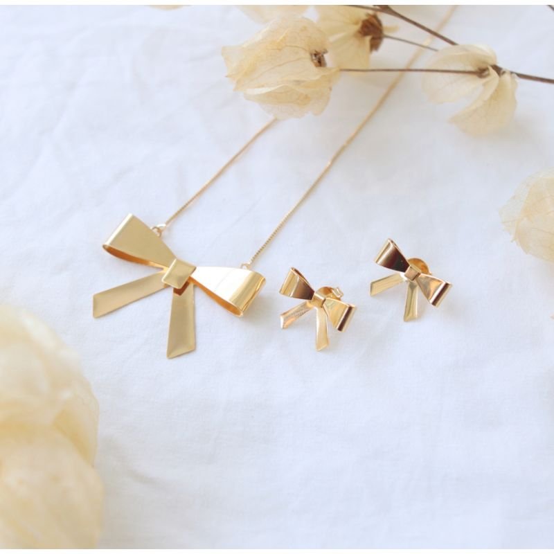 Conjunto laço dobradura dourado
